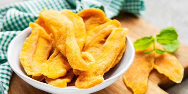 Dried Mango Fruit on grey concrete Background